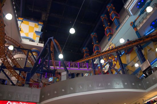 A roller coaster INSIDE of the shopping mall, over the top perhaps?!